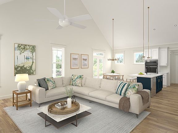 A rendering of the family room and kitchen of the Cordova single family home by Brookfield Residenti