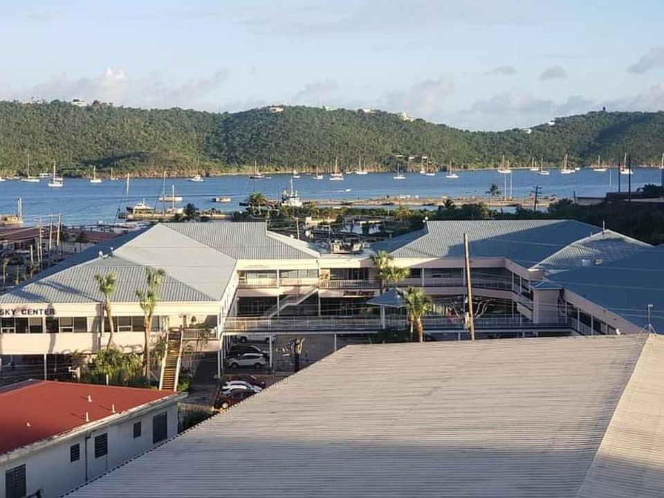 Porch view of Water Island, Nisky Shopping Center, and Crown Bay Cruise Ship Dock.