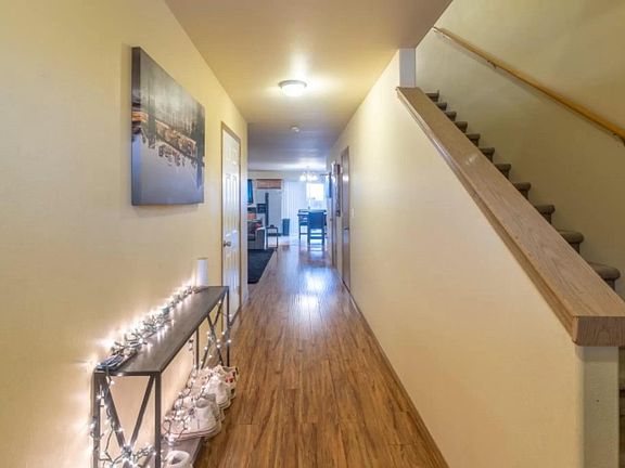 Entry with long hall and stairs to 2nd floor