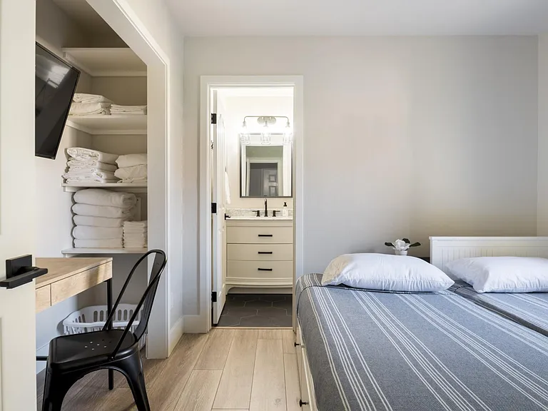 Downstairs bedroom has an en suite full bath