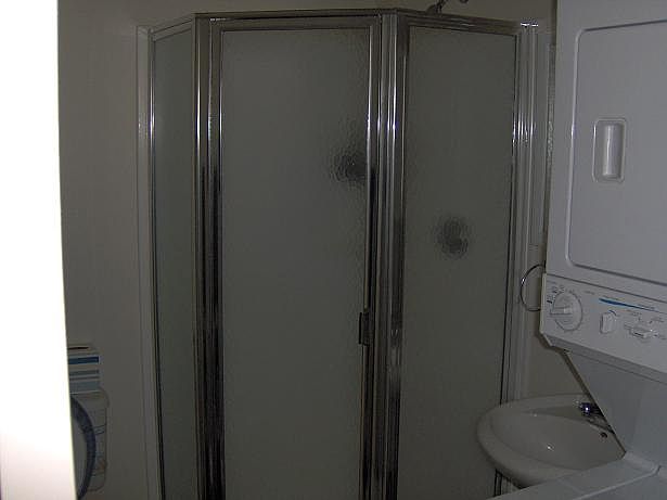 first floor bathroom with washer/dryer