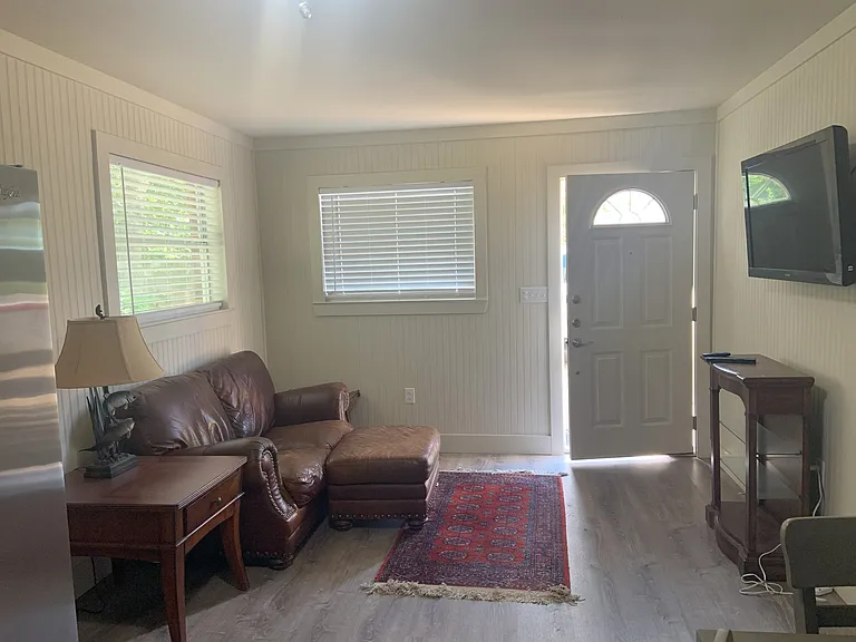 Den area with TV.