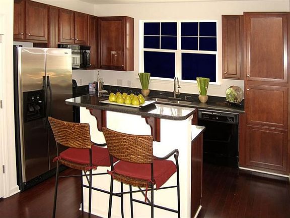  Mini bar area compliments the kitchen. The ss refrigerator is included