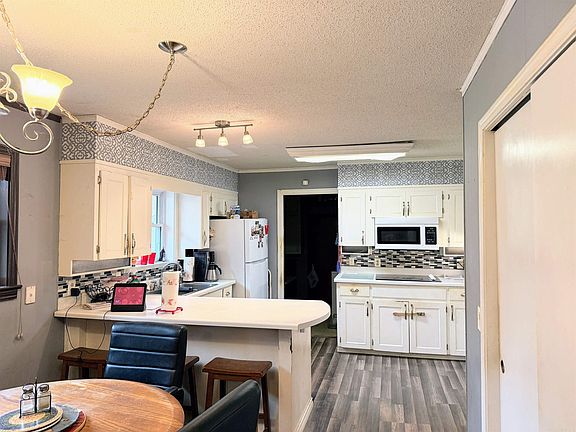 5th image of 9341 Highway 64