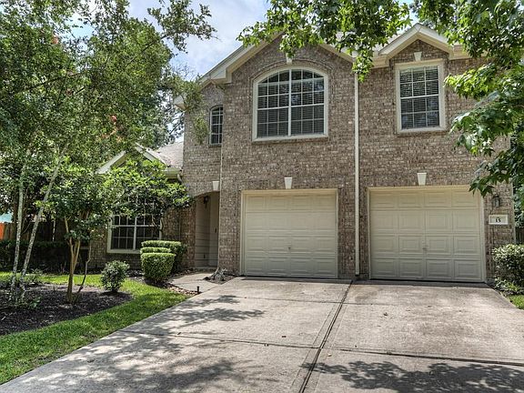 Front elevation with double driveway.