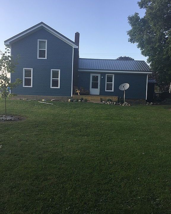 New siding and metal roof
