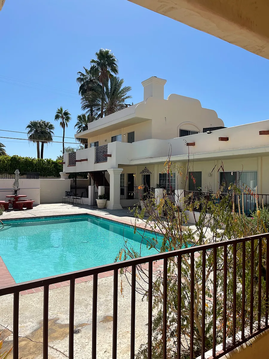 Photo 2 of 23 - 980 N Indian Canyon Dr #8 - Palm Springs, CA Beautiful pool and common area with mountain views! - 980 N Indian Canyon Dr #8