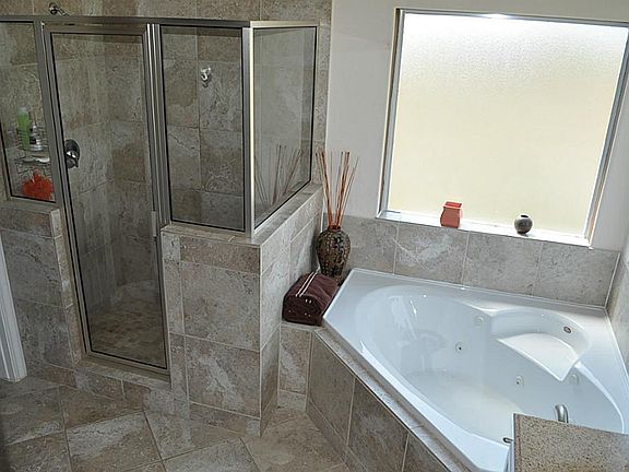  Stand up Shower or JACUZZI tub? You decide
