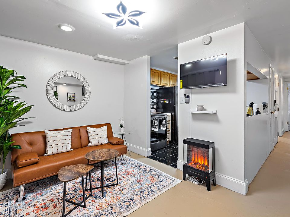 Living Room with Electric Heater Fireplace