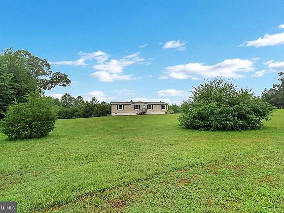 Located on a beautiful almost 2-1/2 acre lot