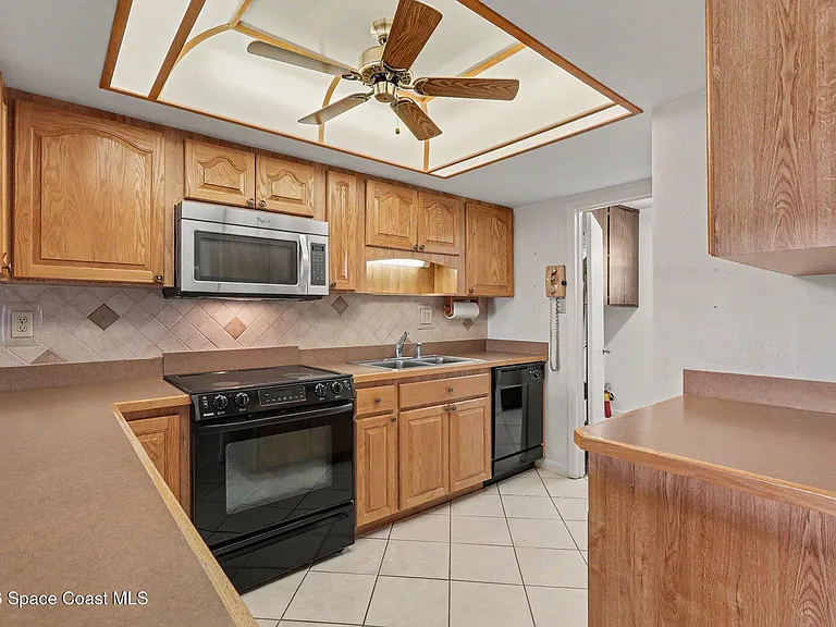 2135 N Courtenay Pkwy #241 — Photo 14