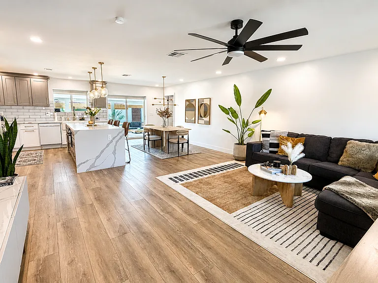 Open layout makes for a great hosting experience. Dining seating for up to 13 guest (3 bar stools, 4 chairs at the dining table and 6 chair dining outdoor table)