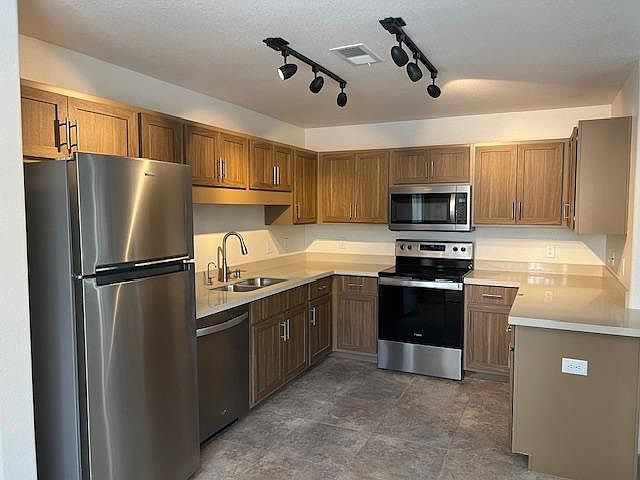 Kitchen with new appliance, quartz countertops