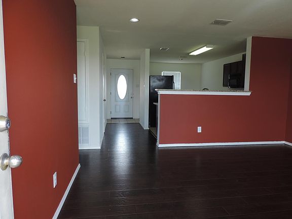 View of Entrance, Living Room, & Kitchen