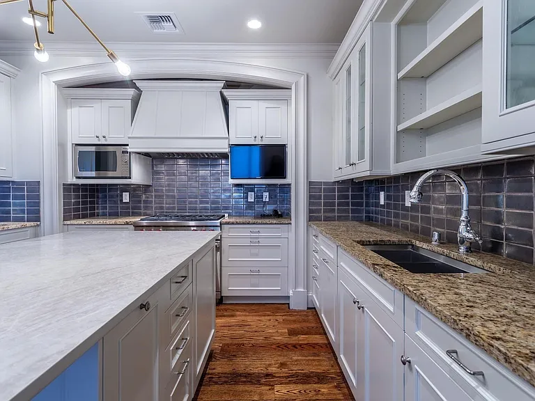 Soft-close custom cabinetry & microwave.