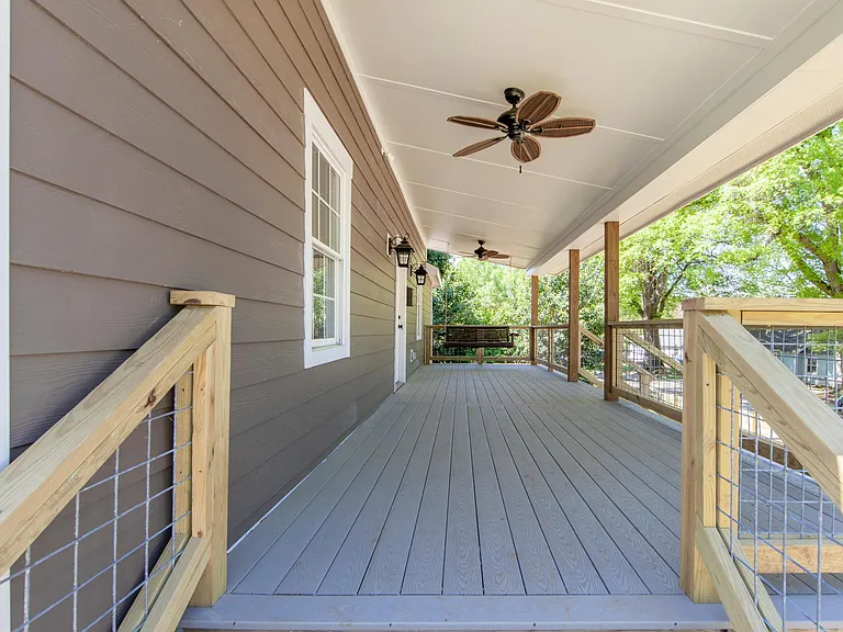 Spacious Front Porch & Love-Seat Swing!