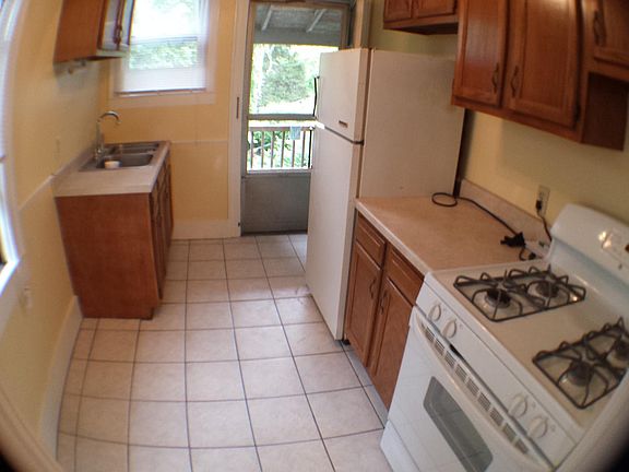 Kitchen has enough room for small tables and chairs. Self cleaning gas range.