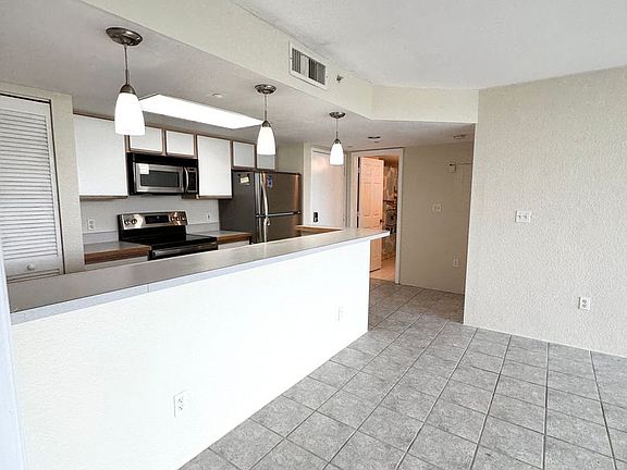 4th image of 3655 Seaside Dr APT 227