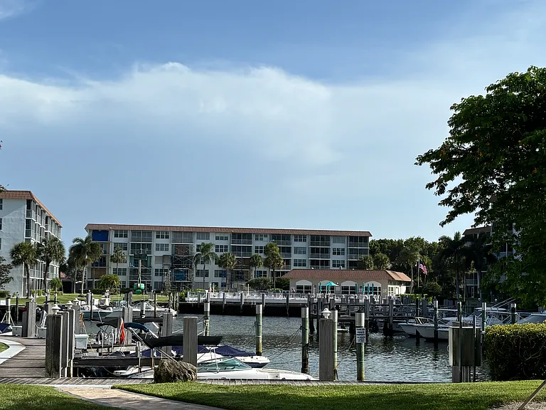 steps away from the Boat docks, club house, gym , putting greens, shuffle board and 3 pools