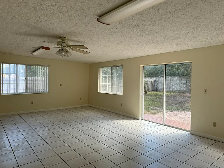 Sunroom and view of backyard