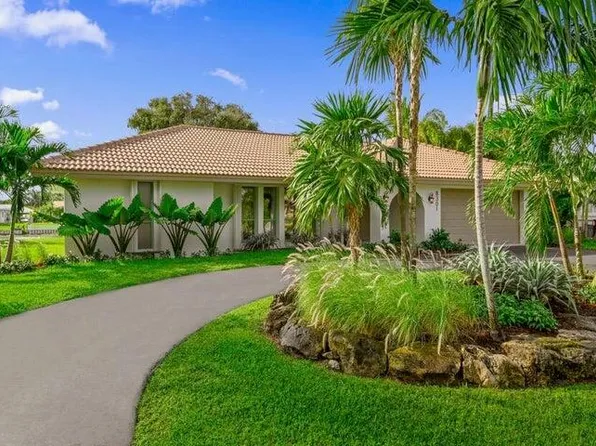 8301 Pine Tree Lane, Lake Clarke Shores, FL 33406