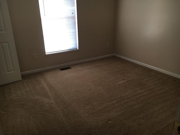 One of three bedrooms