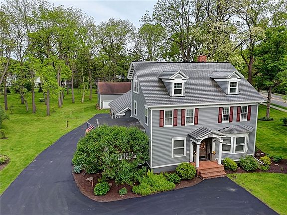 Spread out on nearly 2 acres of park-like privacy