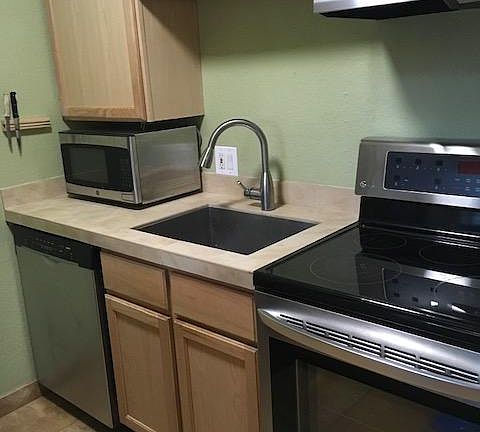Almost new LG range, Bosch dishwasher and GE microwave
