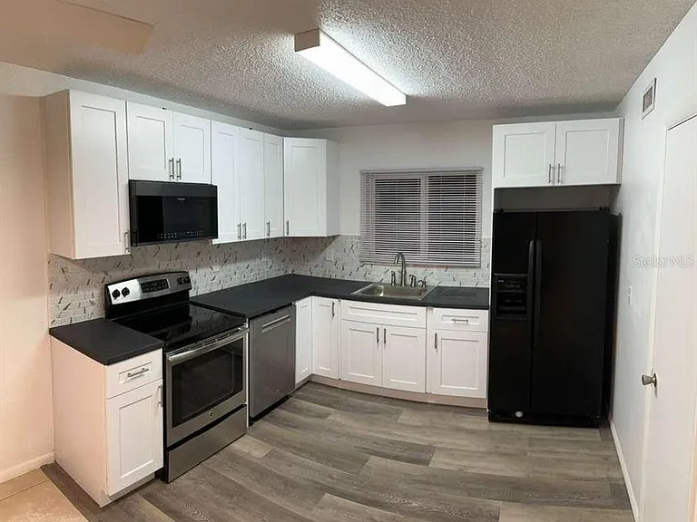1000 Lake Of The Woods Blvd #205H — Photo 5