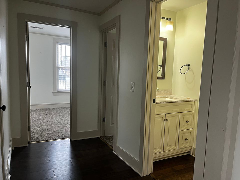 Hallway to bedrooms and bathroom.