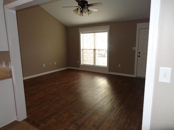 View of living room via dining area