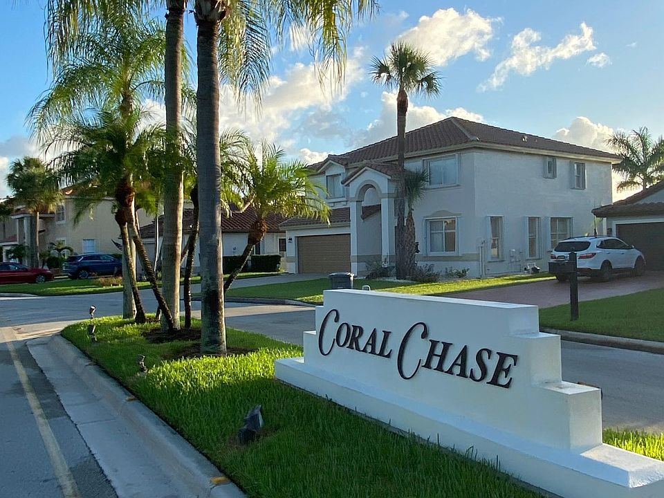 Coral Chase with view of the home