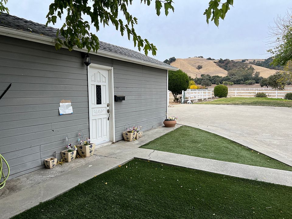 Front door and front turf lawn.