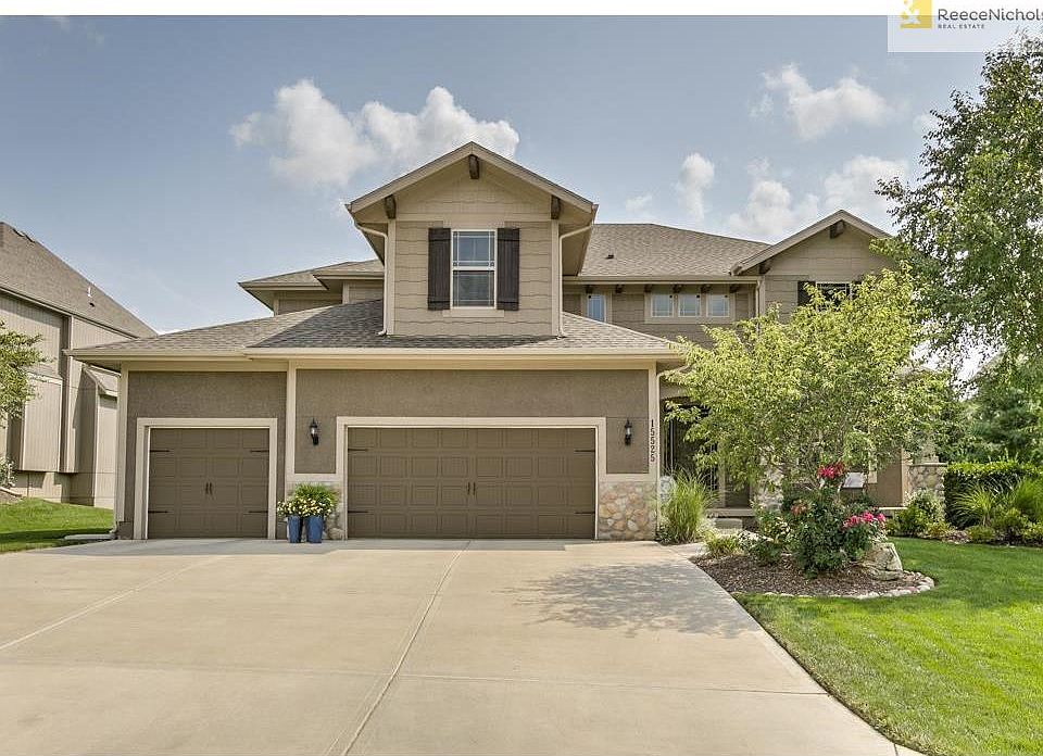 3 car garage and exquisite landscaping!