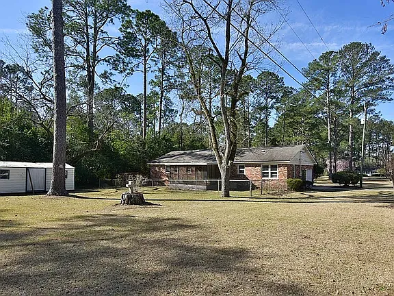 backyard with storage unit in view