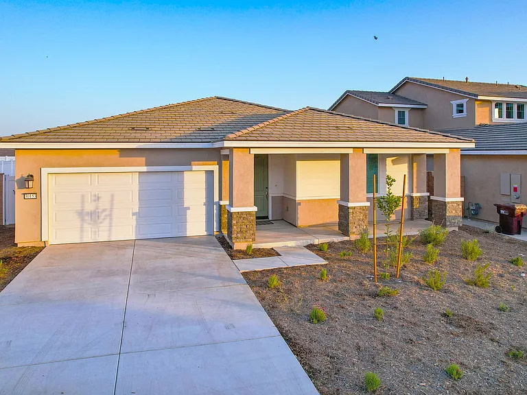 Convenient garage and driveway parking for hassle-free arrivals and departures.