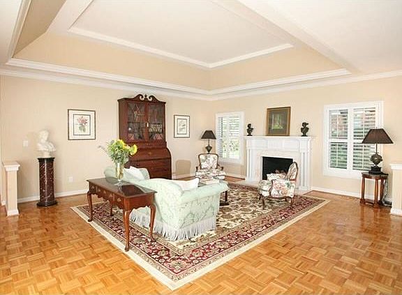 Living Room with fireplace and coffered ceiling