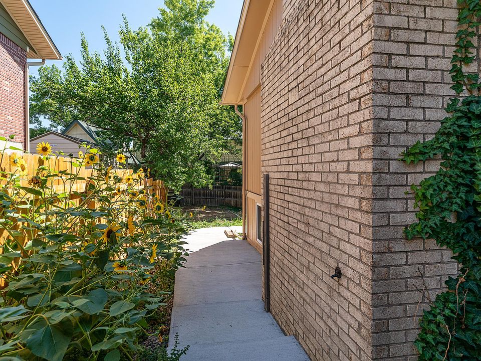 Walkway to apartment on north side of home