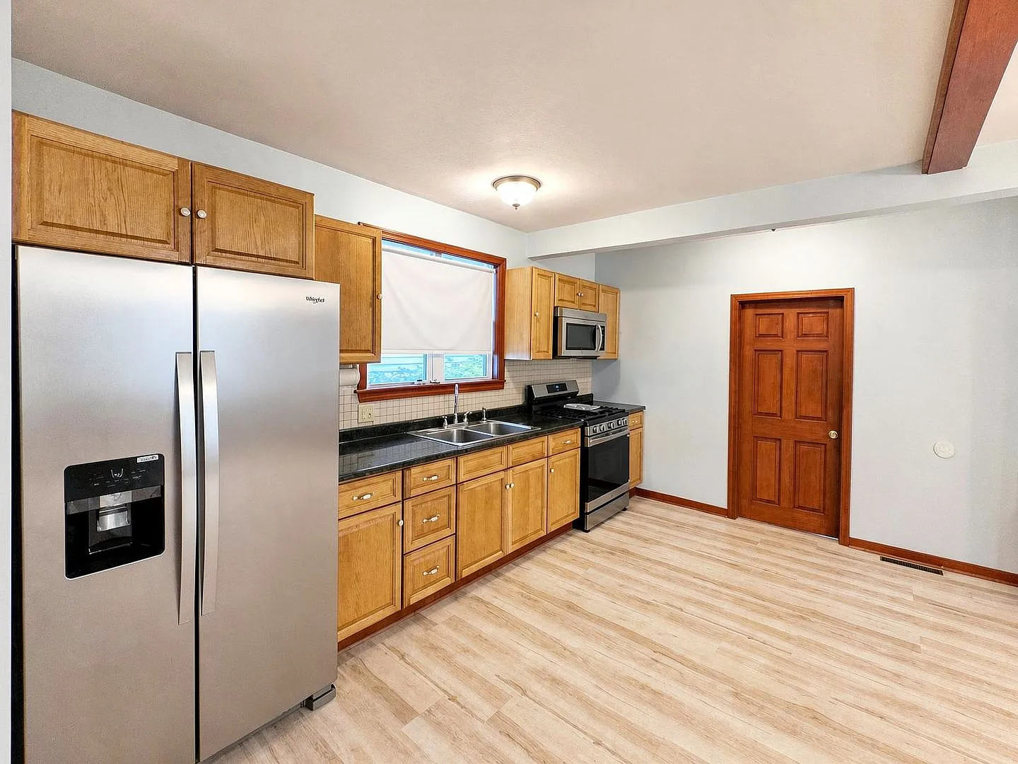 Welcome to 5 Clarks Court, Lowell a beautifully updated 2-bedroom, 1-bath home — Photo 2