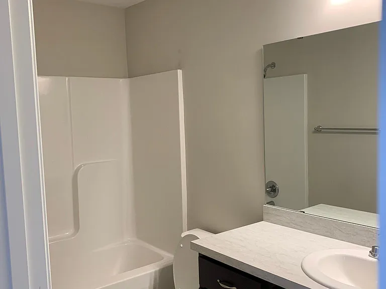 One Full Bath and Two 3/4 Baths Total In This Property!