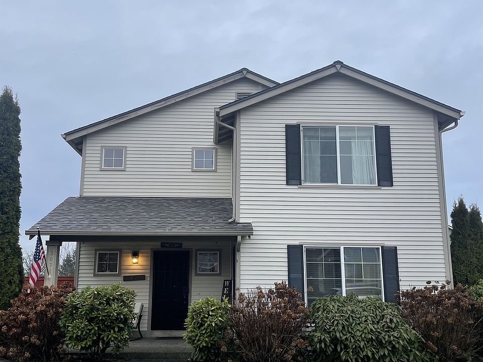 Great location in Dupont, corner lot with front porch.