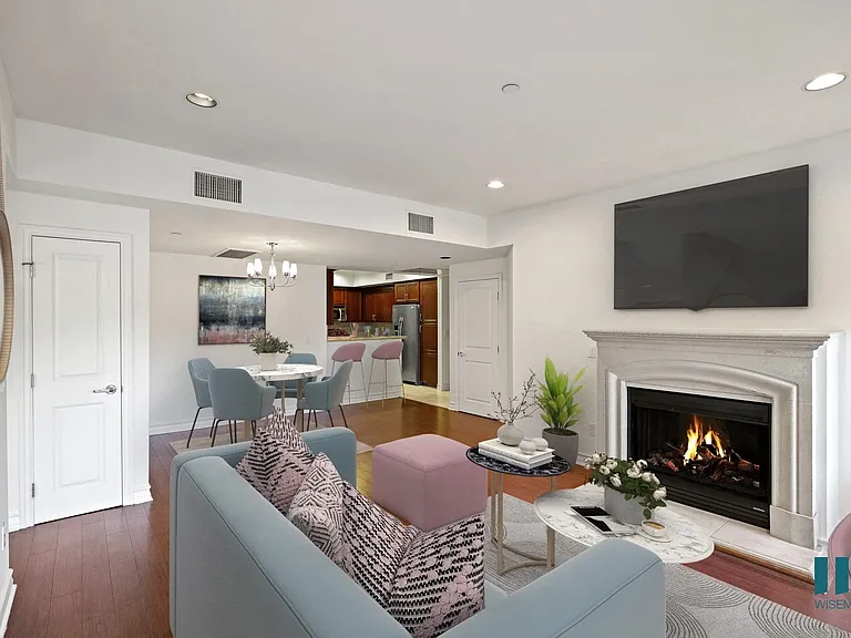 Open-Concept Kitchen, Dining, and Living Room with Hall Closet