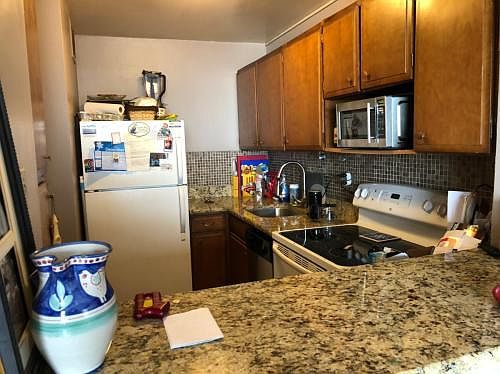 Kitchen pass-through with granite countertops