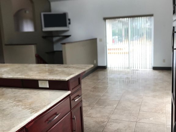 kitchen to dining, stairway to basement