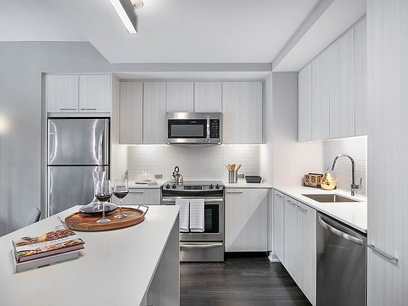 European-style cabinetry with a choice of white wood grain or dark walnut finishes and white lacquer finishes