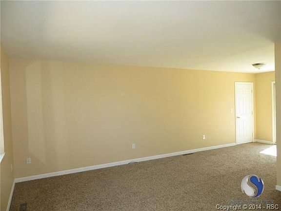 Spacious living room/dining area.