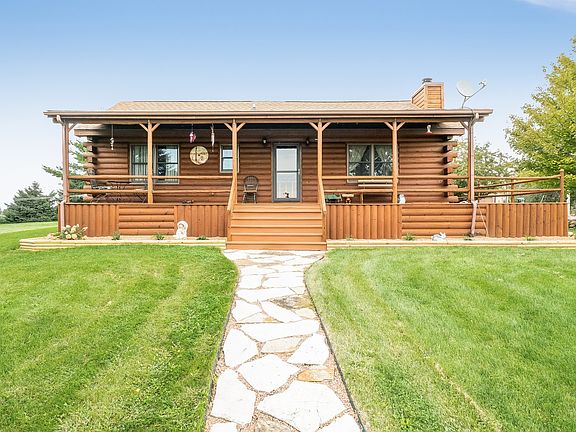 ~Cobblestone pathway leading up to your L shaped porch.