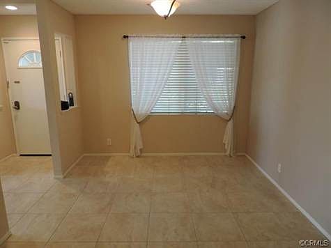 Dining area for family gatherings across from the kitchen wh