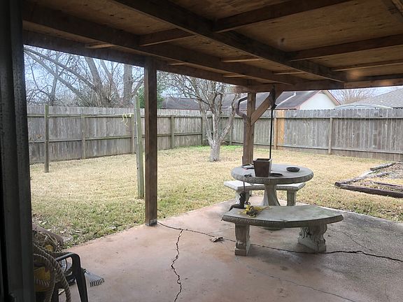 Covered patio and pear tree