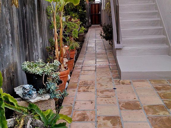 Walkway from front to rear of property.